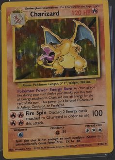 1999 Pokémon Base Set, Unlimited (1999) 4/102 Charizard — Holo, graded CGC 10